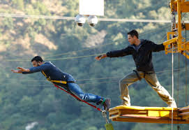 A man doing bungee jumoing in uttarakhand